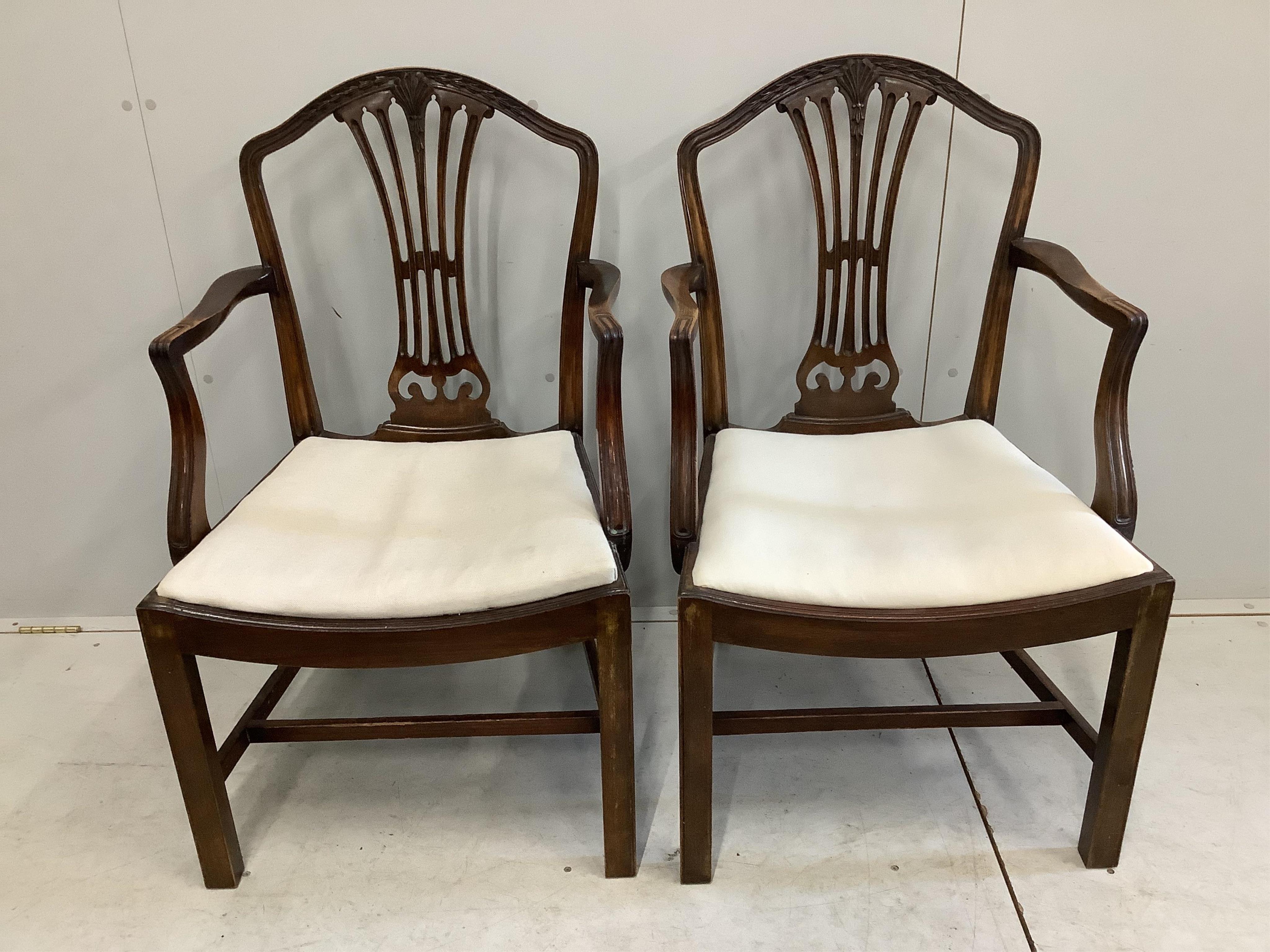 A set of eight George III style mahogany dining chairs,two with arms. Condition - fair to good